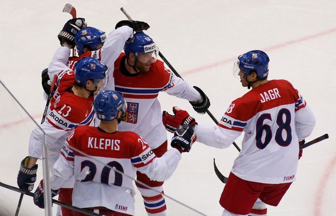 Tomas Hertl of the Czech Republic (obscured) celebrates his goal against the U.S. with team mates during their men's ice hockey World Championship quarter-final game at C