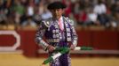 Spanish banderillero Manuel J. Contreras prepares to drive banderillas into a bullfight in Seville