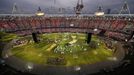 Spectators watch a pre-show in the Olympic Stadium before the opening ceremony of the London 2012 Olympic Games