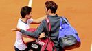 Tennis: Men's Singles - Switzerland's Roger Federer appeals to security after a spectator tries to take a &quot;selfie&quot; on court after his win