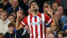 Atletico Madrid's Diego Costa celebrates after scoring a penalty shot for the team during their Champions League semi-final second leg soccer match against Chelsea at Sta