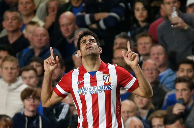 Atletico Madrid's Diego Costa celebrates after scoring a penalty shot for the team during their Champions League semi-final second leg soccer match against Chelsea at Sta