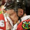 Blackhawks Marian Hossa cools off at the bench during overti