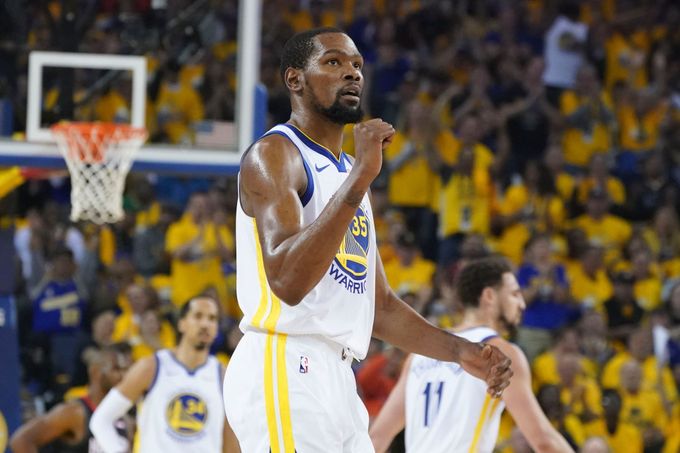 April 28, 2019; Oakland, CA, USA; Golden State Warriors forward Kevin Durant (35) celebrates against the Houston Rockets during the second quarter in game one of the seco