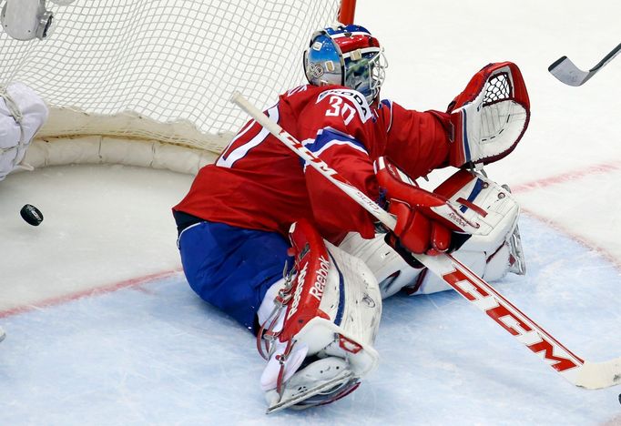 Norway's goalie Lars Haugen concedes a gaol of Slovakia's Juraj Mikus (unseen) during the first period of their men's ice hockey World Championship group A game at Chizho