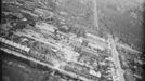 Bomb Damage in London, England, April 1945 Aerial view from the west of the damage resulting from a V2 rocket missile which exploded in the area of Boleyn and Priory Road