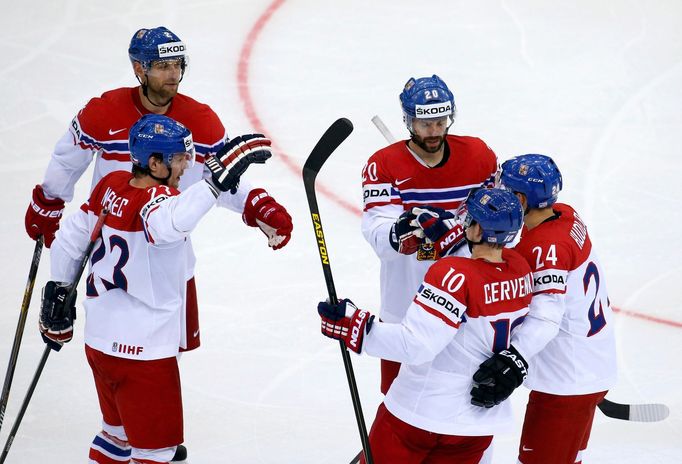 Jakub Kindl of the Czech Republic (top, L) celebrates his goal against Denmark during the third period of their men's ice hockey World Championship Group A game at Chizho