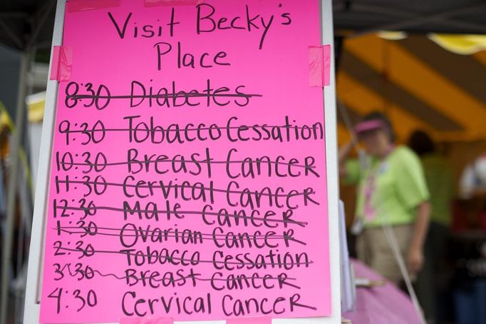 A board lists the variety of medical talks offered at the Remote Area Medical (RAM) clinic in Wise, Virginia July 20, 2012. RAM clinics bring free medical, dental and vision care to uninsured and under-insured people across the country and abroad. The Wise clinic was the 647th RAM expedition since 1985 and drew 1700 patients from 14 states, organizers said. Picture taken July 20, 2012. REUTERS/Mark Makela (UNITED STATES - Tags: HEALTH SOCIETY) Published: Čec. 24, 2012, 3:23 odp.