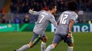 Real Madrid's Cristiano Ronaldo (L) celebrates after scoring against AS Roma