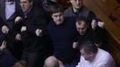 Ukrainan deputies fight during a session of parliament in Kiev February 21, 2014. Fighting broke out between deputies in Ukraine's parliament on Friday when the speaker d