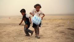 Děti, které utekly před násilím v Mosulu, v táboře u Irbílu.