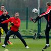 Manchester United's Van Persie, manager Moyes and Giggs laugh as Darren Fletcher jumps for the ball during a training session at the club's Carrington training complex in Manchester
