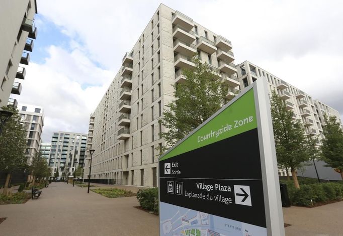 A sign is seen in the Countryside zone of the Olympic Village built for the London 2012 Olympic Games in Stratford, east London on June 29, 2012. The village will accomodate up to 16,000 athletes and officials from more than 200 nations. Picture taken June 29, 2012.REUTERS/Olivia Harris (BRITAIN - Tags: BUSINESS CONSTRUCTION CITYSPACE SPORT OLYMPICS) Published: Čer. 30, 2012, 12:29 odp.