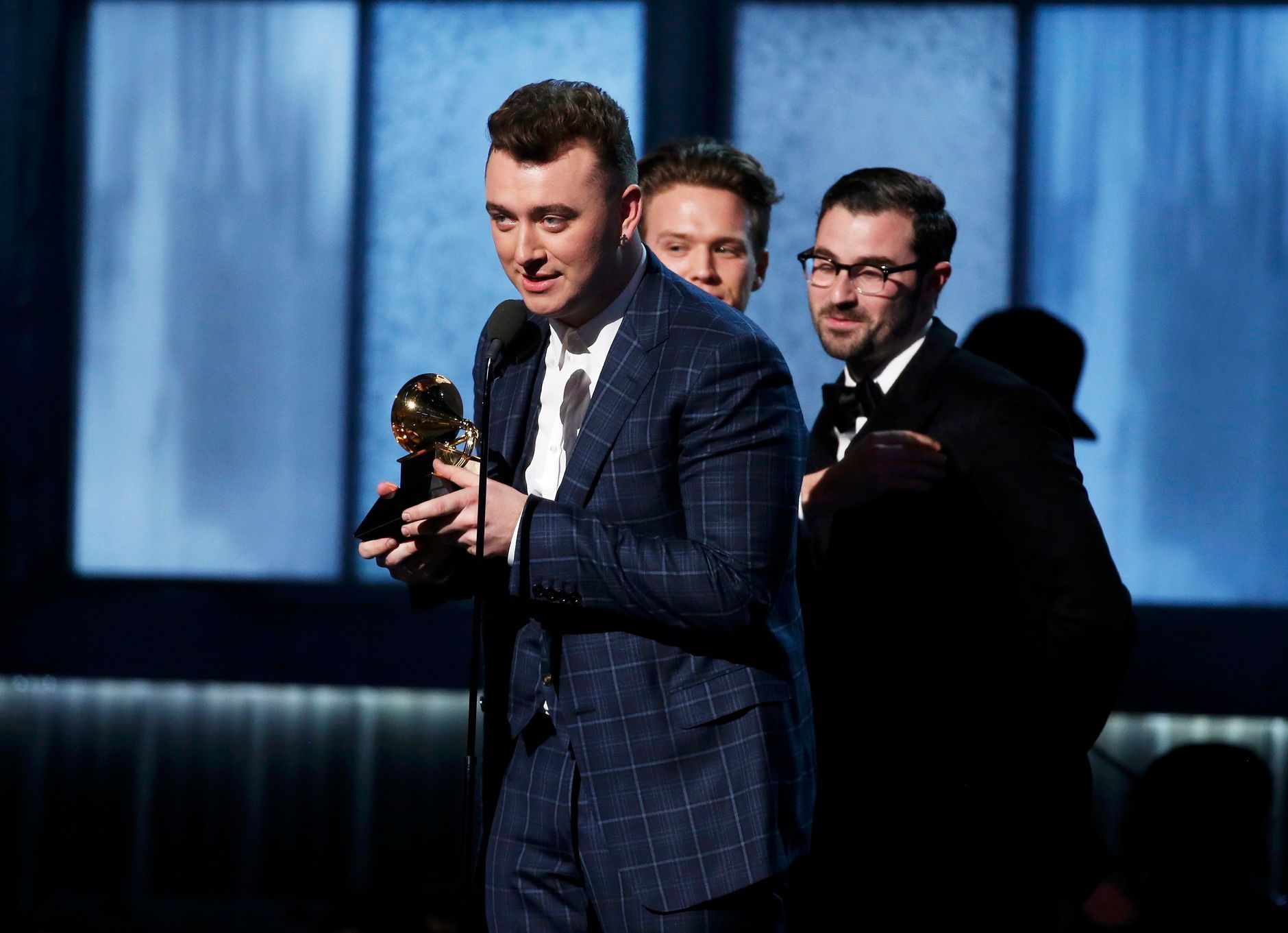 Sam Smith accepts his award during the 57th annual Grammy Awards in Los Angeles
