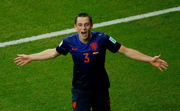 Stefan de Vrij of the Netherlands celebrates after scoring a goal during their 2014 World Cup Group B match against Spain at the Fonte Nova arena in Salvador June 13, 201