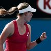 Riske of the U.S. celebrates defeating Wickmayer of Belgium during their women's singles match at Australian Open 2014 tennis tournament in Melbourne
