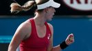 Alison Riske of the U.S. celebrates defeating Yanina Wickmayer of Belgium during their women's singles match at the Australian Open 2014 tennis tournament in Melbourne Ja