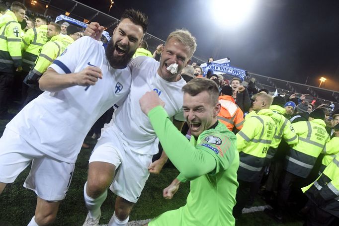 Soccer Football - Euro 2020 - Group J Qualification - Finland v Liechtenstein - Helsinki, Finland November 15, 2019. Finnish captain Tim Sparv celebrates with Paulus Araj