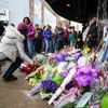 Fans lay flowers and memorials outside First Avenue the nightclub where U.S. music superstar Prince got his start in Minneapolis Minnesota