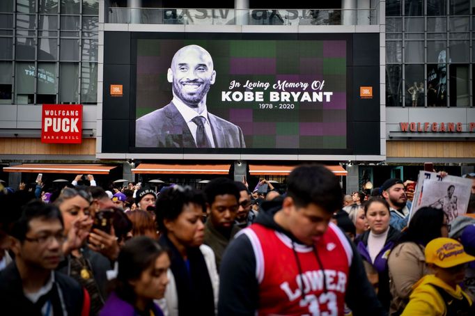 Jan 26, 2020; Los Angeles, CA, USA;  Fans mourn the loss of NBA legend Kobe Bryant outside of the Staples Center in Los Angeles. Mandatory Credit: Harrison Hill-USA TODAY