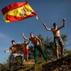 Supporters celebrate Honda MotoGP Spanish rider Marc Marquez's victory in the Spanish Grand Prix at Jerez racetrack