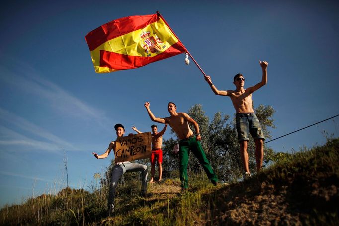 Supporters celebrate Honda MotoGP Spanish rider Marc Marquez's victory in the Spanish Grand Prix at Jerez racetrack, on a road in the outskirts of Algodonales, near Jerez