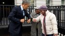 Dec. 31, 2012 "Following remarks in the Eisenhower Executive Office Building on the fiscal cliff negotiations, the President greets a couple of OMB workers as he walked back across on West Executive Avenue as he walked back to the West Wing of the White House. He gave them an elbow-bump, because he had just put Purell on his hands