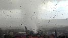 Debris flies through the air as a freak tornado tears through the coastal town of Lennox Head on June 3, 2010. The storm levelled 12 homes and damaged another 30, with twisting winds carving out a 300 metre-wide path of destruction, injuring six people and leaving thousands without power.