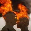 The art installation Embrace burns during the Burning Man 2014 &quot;Caravansary&quot; arts and music festival in the Black Rock Desert of Nevada