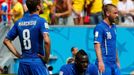 Italy's Claudio Marchisio, Balotelli and De Rossi react after a goal by Costa Rica's Bryan Ruiz during World Cup Group D soccer match at the Pernambuco arena