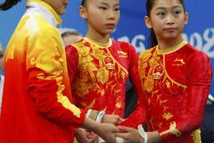 Rozhodnuto: Čínský podvod s gymnastkami se nekonal