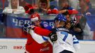 Russia's Yevgeni Malkin (L) scuffles with Finland's Esa Lindell during their Ice Hockey World Championship game at the CEZ arena in Ostrava, Czech Republic May 12, 2015.