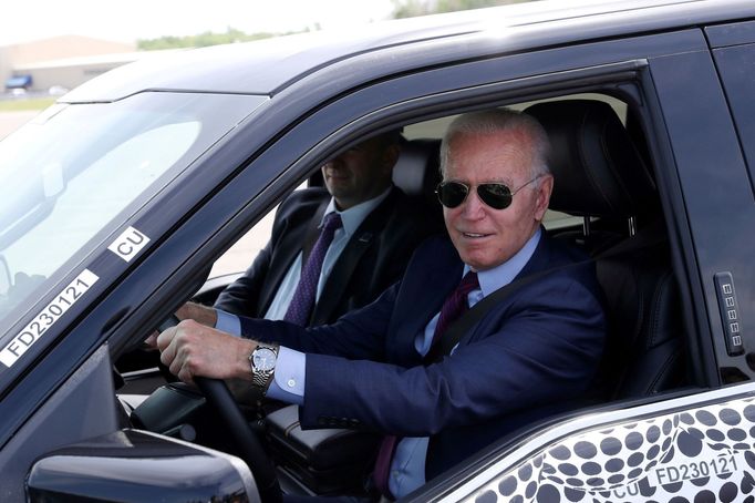 FILE PHOTO: U.S. President Joe Biden tests the new Ford F-150 Lightning truck as he visits VDAB at Ford Dearborn Development Center in Dearborn, Michigan, U.S., May 18, 2