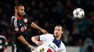 Bayer Leverkusen's Toprak challenges Paris St Germain's Ibrahimovic during their Champions League soccer match in Leverkusen