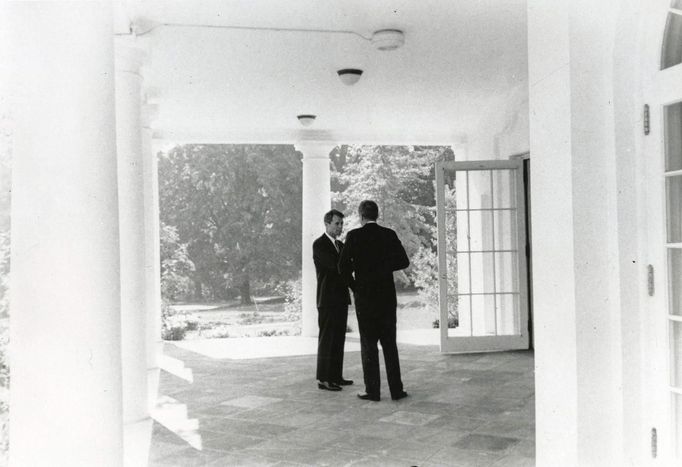 Former United States President John F. Kennedy meets with his brother, former Attorney General Robert F. Kennedy, at the White House in Washington, in this handout image taken on October 3, 1962.