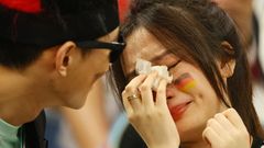 Zklamaná německá fanynka po zápase MS 2022 Kostarika - Německo