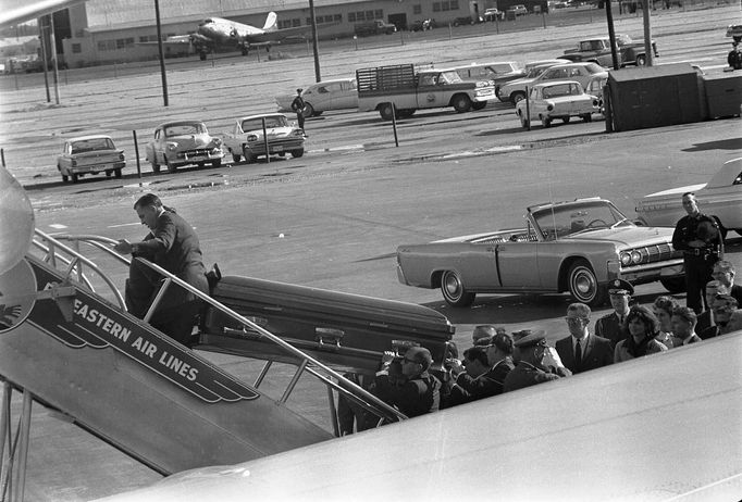 The casket of former U.S. President John F. Kennedy is loaded aboard Air Force One at Love Field in Dallas,Texas, in this handout image taken on November 22, 1963. Friday, November 22, 2013, will mark the 50th anniversary of the assassination of President Kennedy.