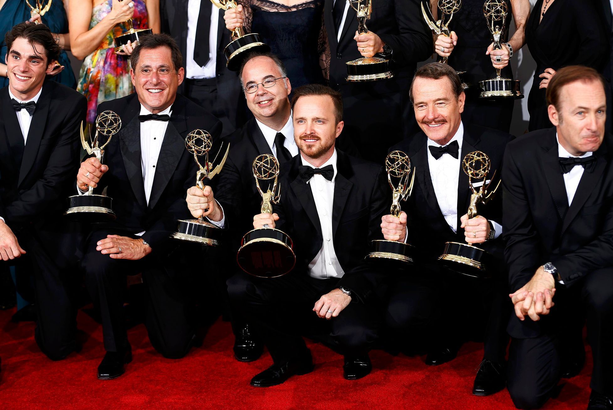 The cast and crew of &quot;Breaking Bad&quot; pose with their outstanding drama series award at the 66th Primetime Emmy Awards in Los Angeles