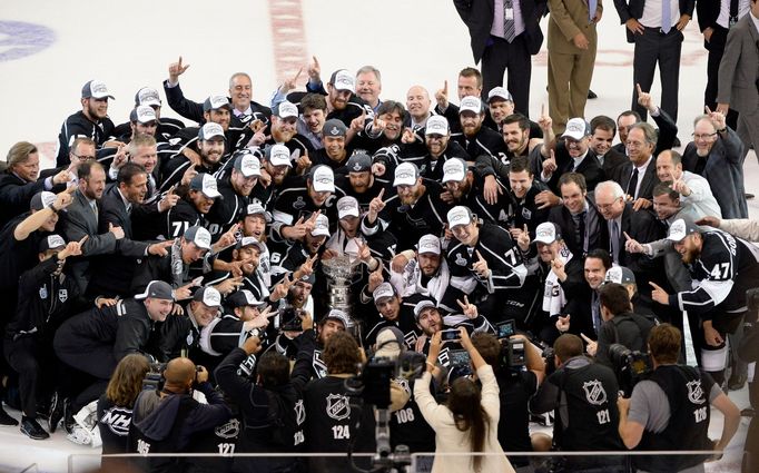 Jun 13, 2014; Los Angeles, CA, USA; The Los Angeles Kings pose for a team photo with the Stanley Cup after defeating the New York Rangers in the second overtime period in