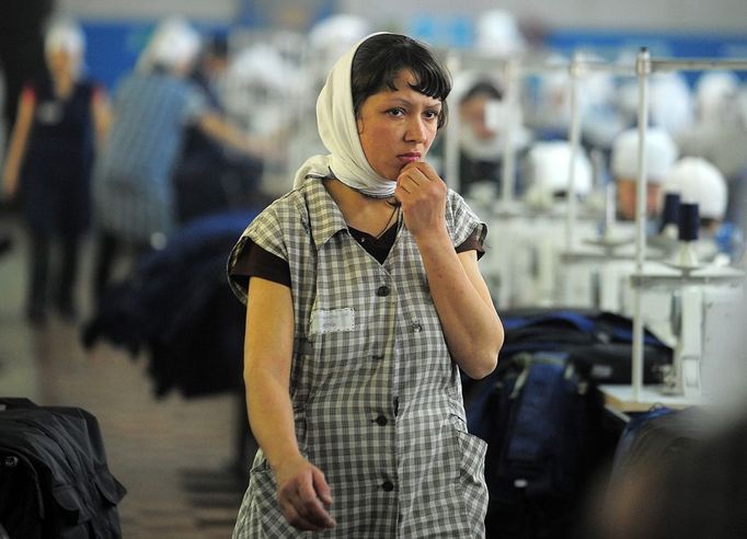 Female Penal Colony No. 3 of UFSIN for Ivanov region 1103515 Russia, Kineshma. 04/24/2012 Inmates at the Female Penal Colony No. 3 of the Administration of the Federal Penitentiary Service (UFSIN) of Russia for the Ivanov region work at the colony's sewing shop.