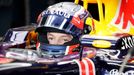 Red Bull Formula One driver Daniil Kvyat of Russia sits in his car in the team garage during the third practice session of the Australian F1 Grand Prix at the Albert Park