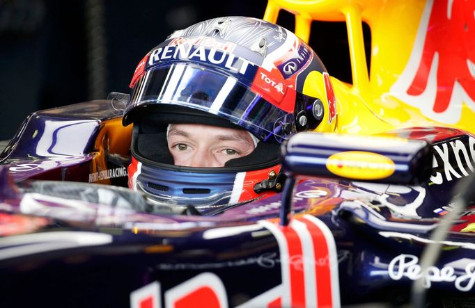 Red Bull Formula One driver Daniil Kvyat of Russia sits in his car in the team garage during the third practice session of the Australian F1 Grand Prix at the Albert Park