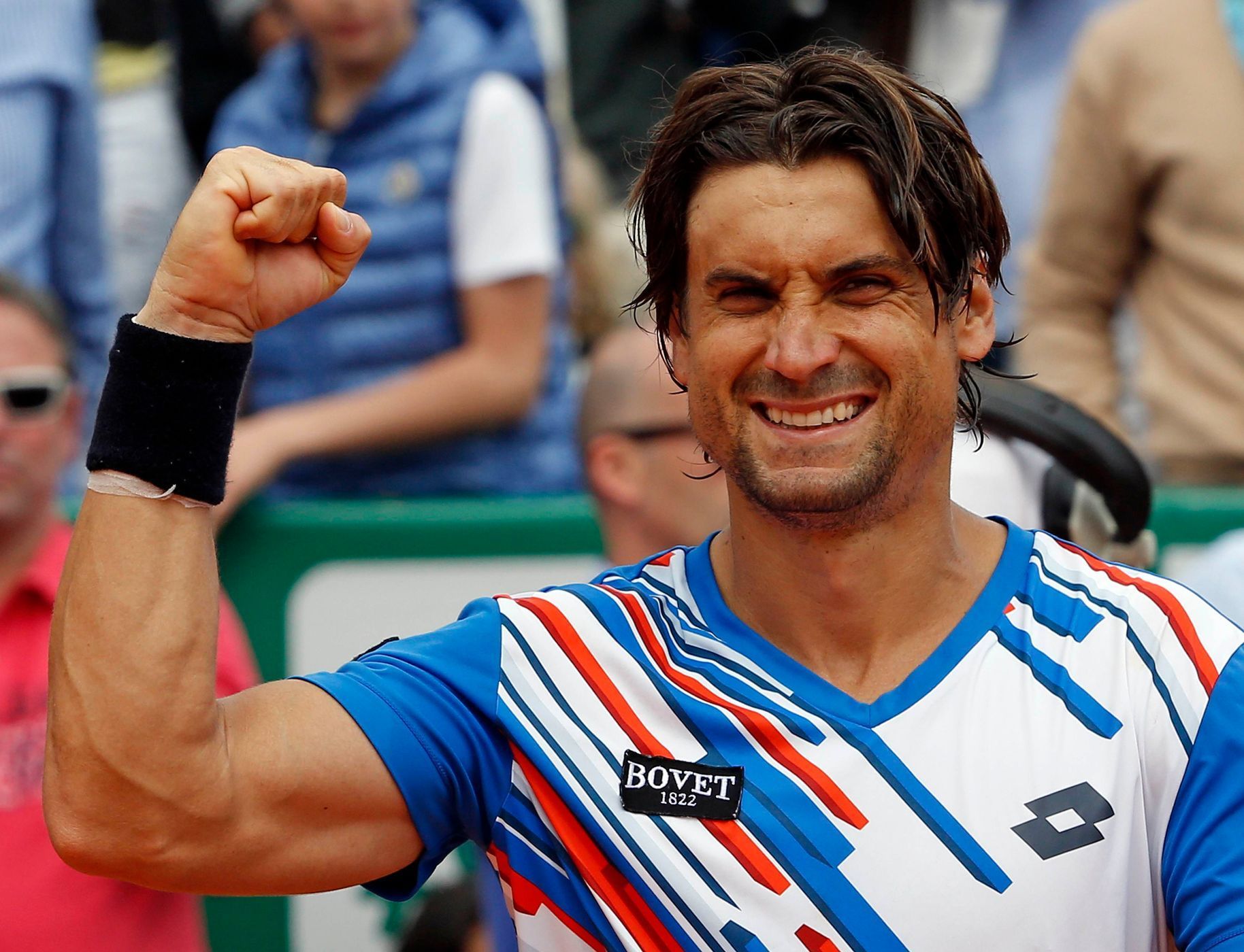 Ferrer of Spain celebrates after defeating his compatriot Rafael Nadal during their quarter-final match at the Monte Carlo Masters in Monaco