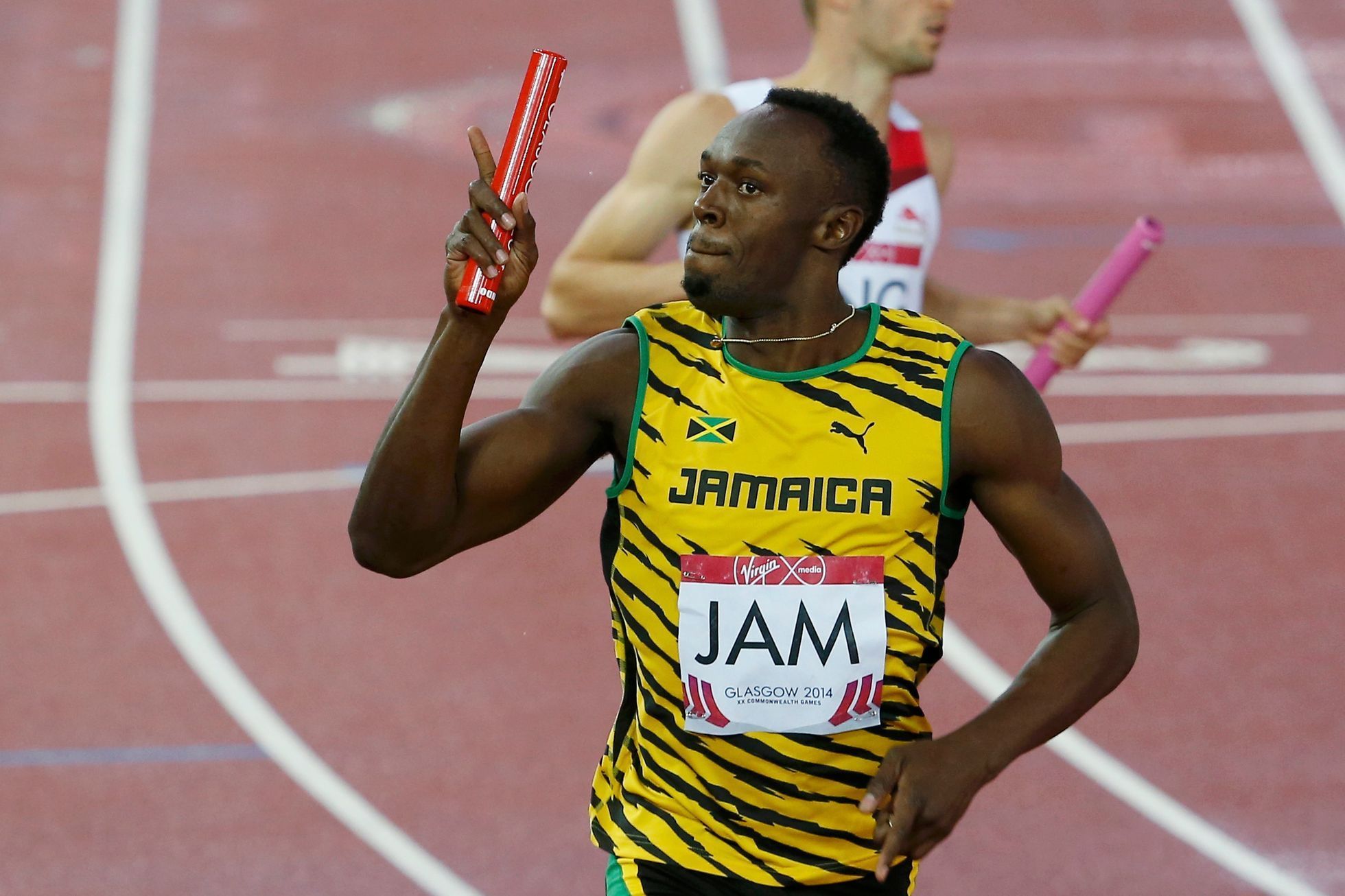 Usain Bolt slaví triumf ve štafetě na Hrách Commonwealthu 2014