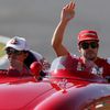 Ferrari Formula One driver Alonso of Spain waves during the drivers' parade during the Japanese F1 Grand Prix at the Suzuka circuit
