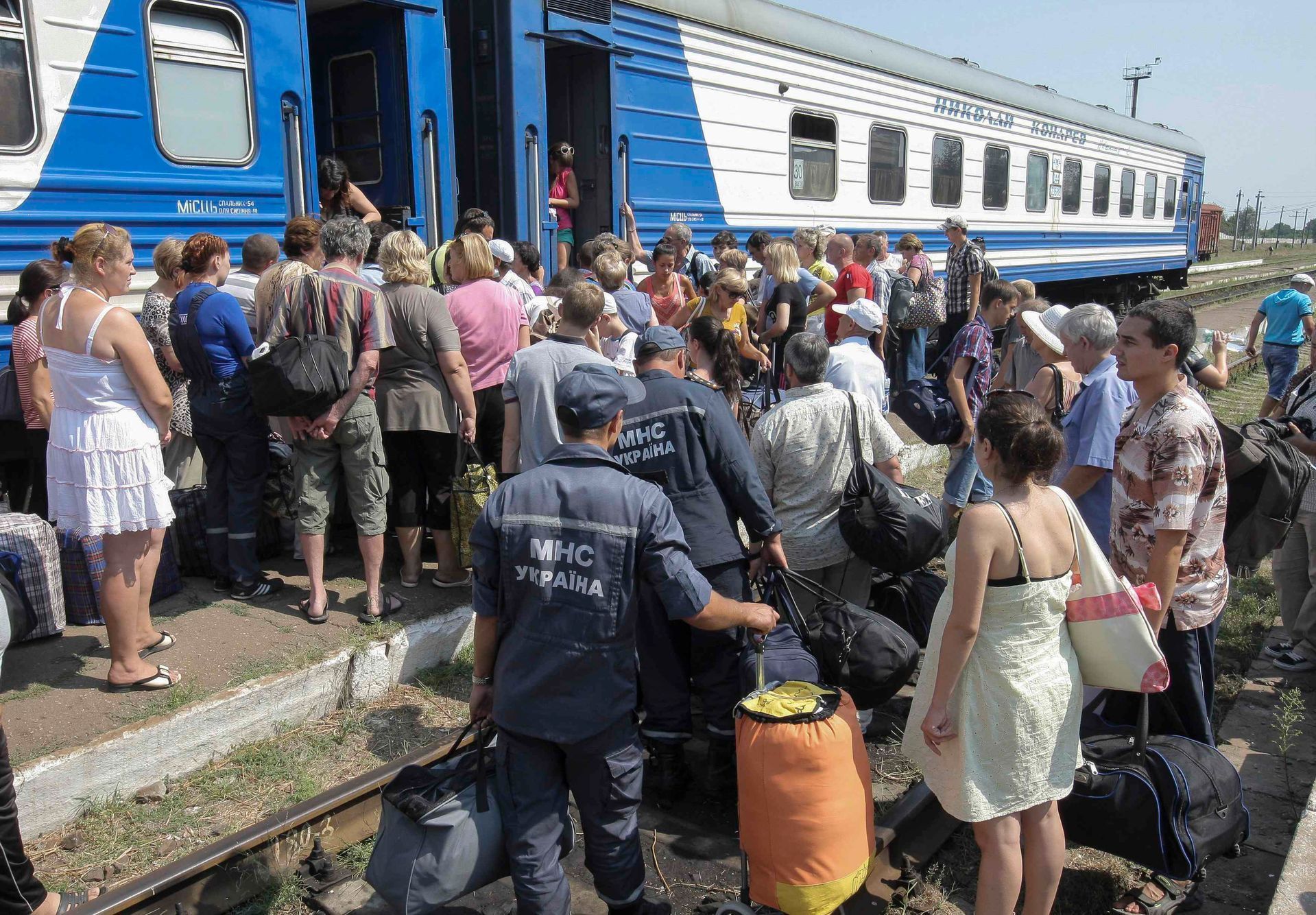 Ukrajina - Luhanská oblast - uprchlíci - vlak