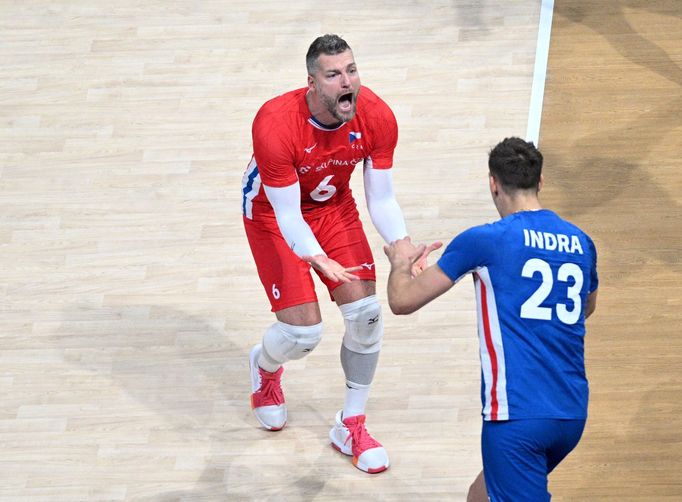 Milan Moník a Patrik Indra se radují z bodu proti Íráncům.