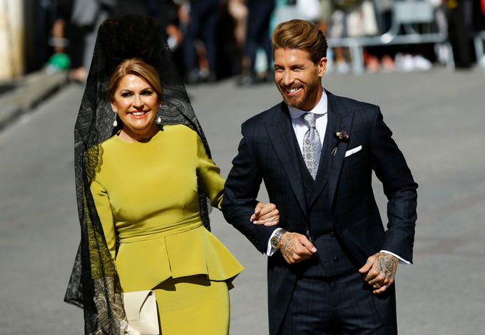 Real Madrid captain Sergio Ramos walks next to his mother Paqui Garcia at his wedding with Pilar Rubio at the cathedral in Seville, Spain June 15, 2019. REUTERS/Marcelo d