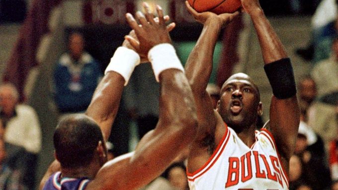 FILE PHOTO: ON THIS DAY -- June 4   June 4, 1997     BASKETBALL - Chicago Bulls' Michael Jordan shoots over Utah JazzÕs Karl Malone during the first period of the second