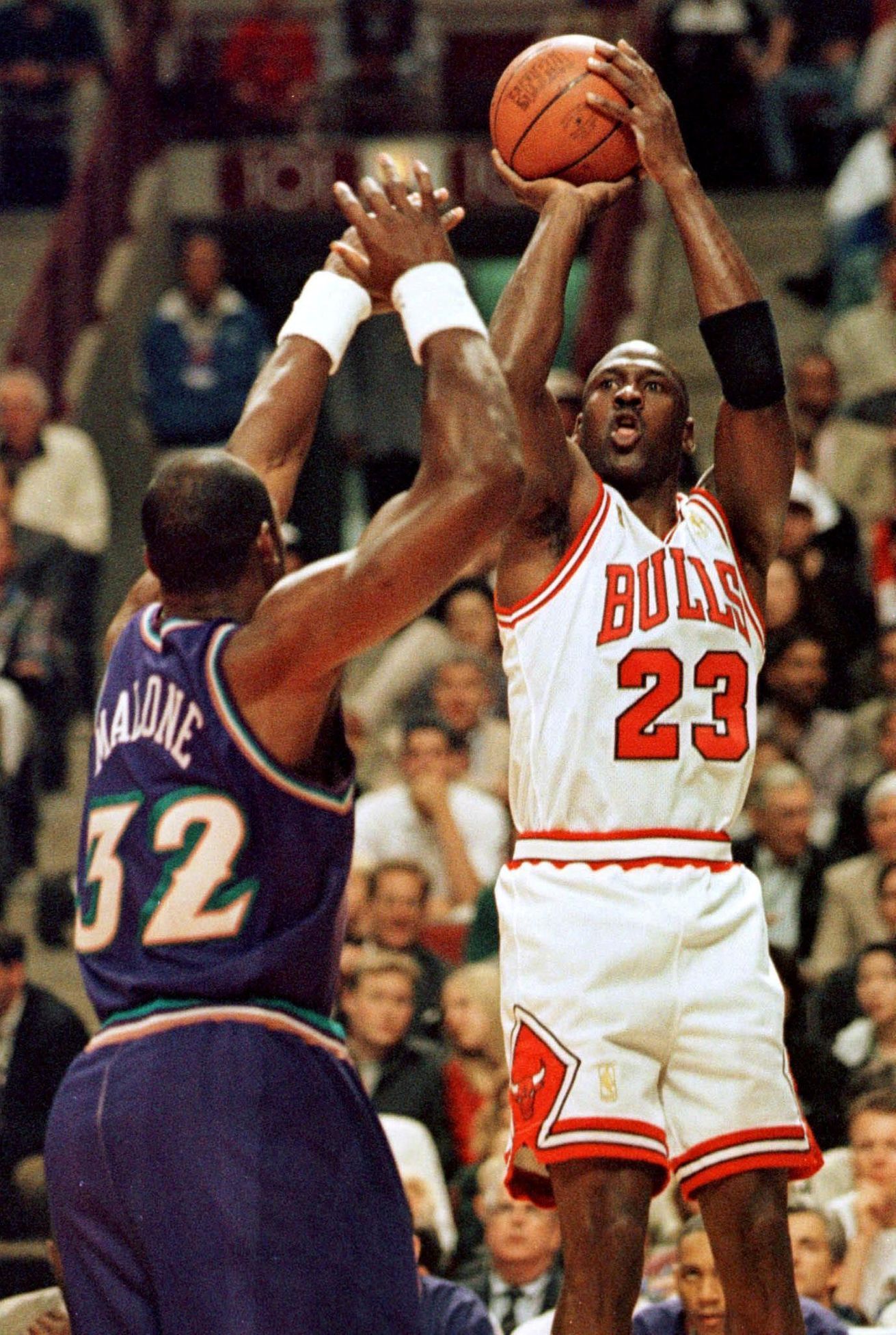 FILE PHOTO: Chicago Bulls' Michael Jordan shoots over Utah JazzÕs Karl Malone during the first period of the second game of the NBA Finals at the United Center, Chicago.